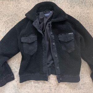 Calvin Klein fluffy black jacket with denim edges
